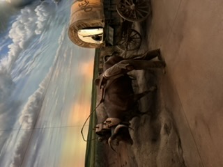 Pioneer wagon trail exhibit inside the Archway