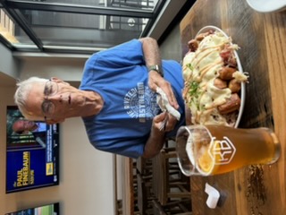 German nacho plate — pretzel bites, sauerkraut, corned beef, and cheese