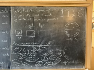 Math problems on the schoolhouse blackboard