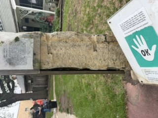 A limestone post on display
