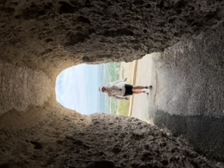 Tunnel under the bluff rocks