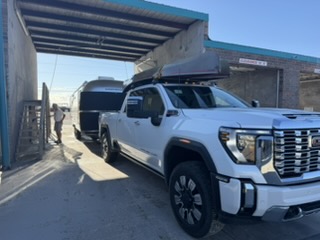 Washing the trailer and solar panels at the car wash
