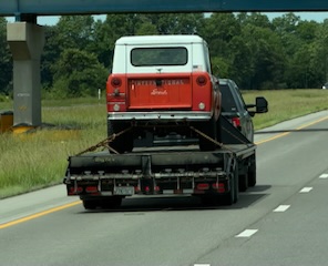 A classic red Bronco on a flatbed — Keith's kind of find