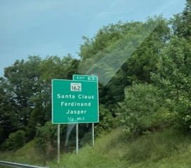 Santa Claus, Ferdinand, and Jasper — highway exit sign in Indiana