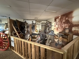 Blacksmith tools and saddle display