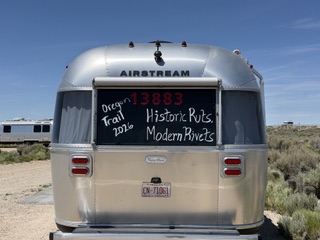 Slogan painted on the back window of the rig