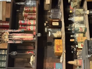 Historic pharmacy shelves at Kam Wah Chung